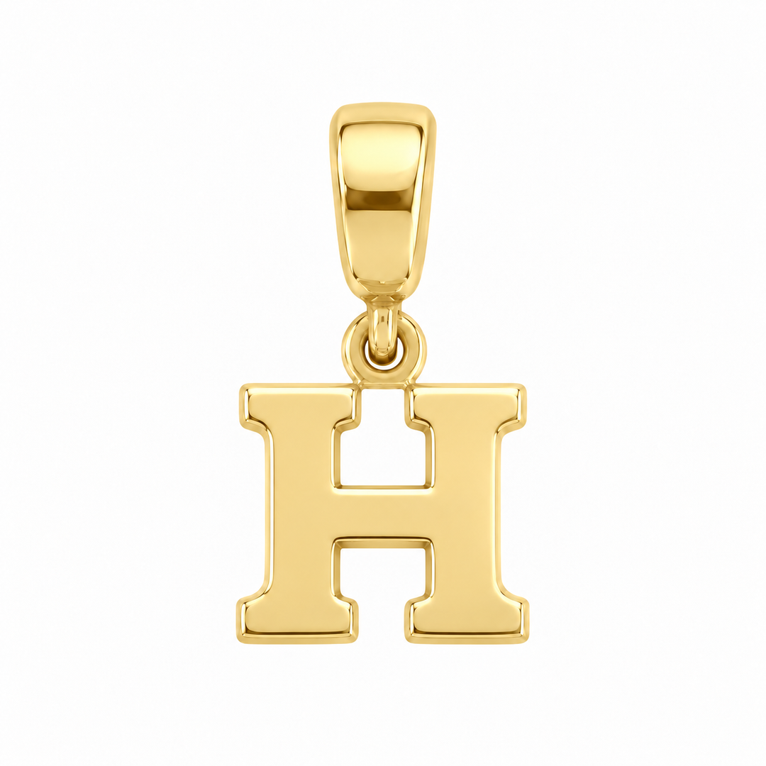 14K yellow gold initial H charm pendant on white background