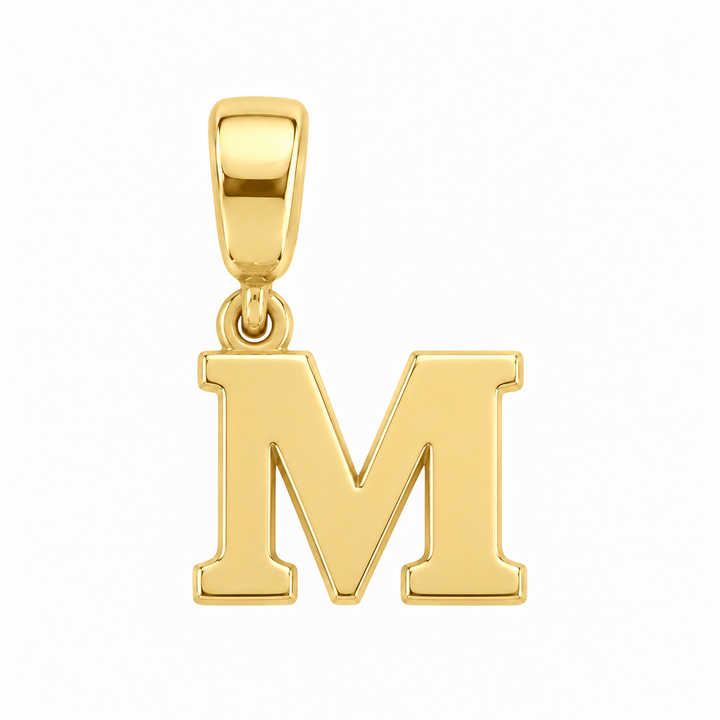 14K yellow gold initial M charm pendant on white background