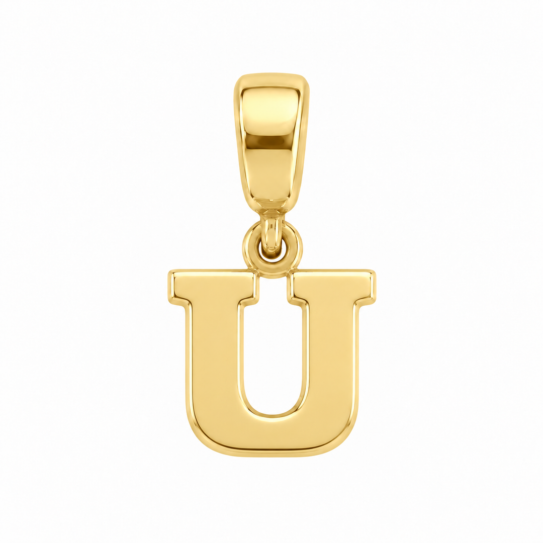 14K yellow gold initial U charm pendant on white background