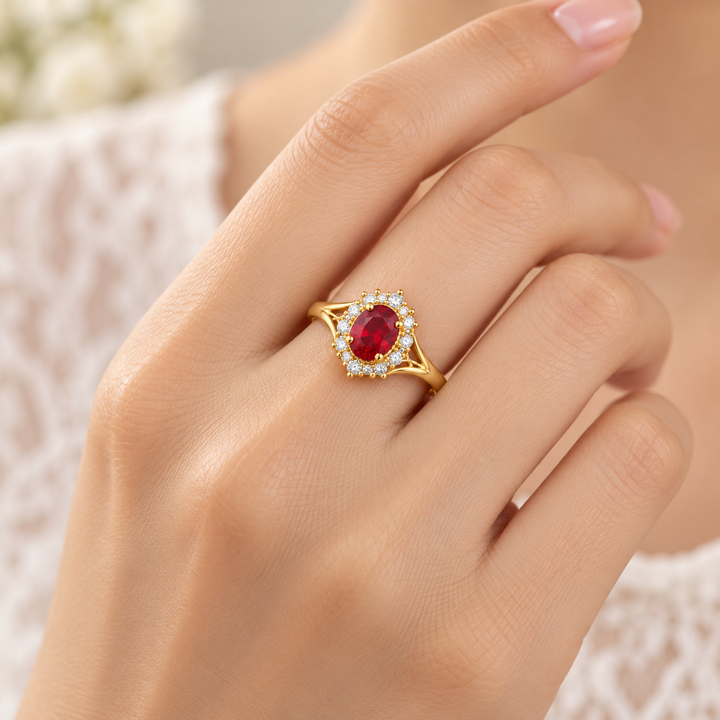 14K Yellow Gold Red Oval CZ Halo Ring on model hand